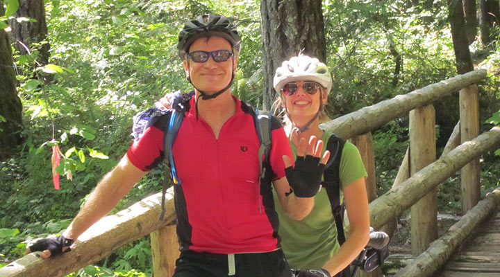 JIm Vogele and his wife on a bike ride